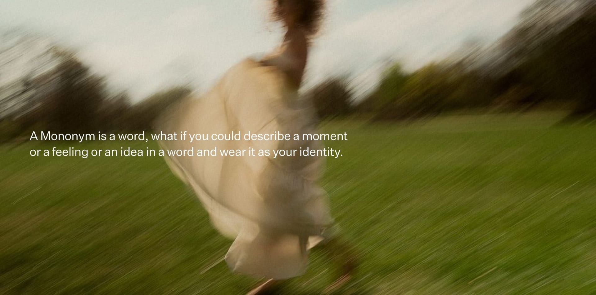 A blurred figure running across a field